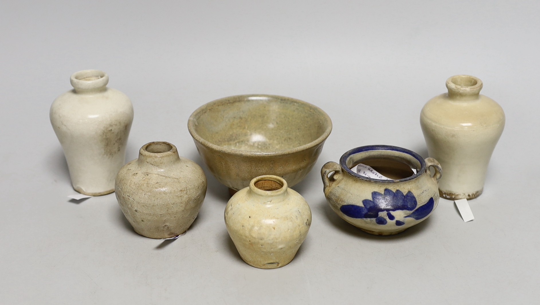 A group of Chinese blanc de chine small jars, Fujian kilns, 15th - 17th century and other vessels, tallest 9.5 cm